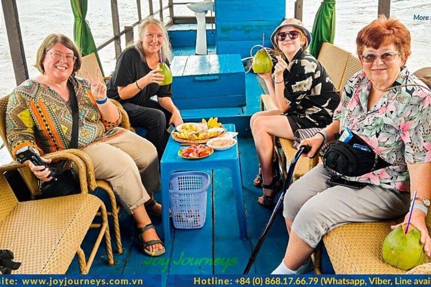 Having fruit and coconut juice while cruising 2