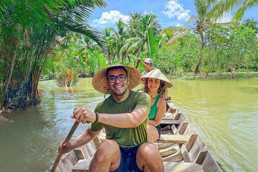 Taking a rowing boat through the coconut canals of Ben Tre 2