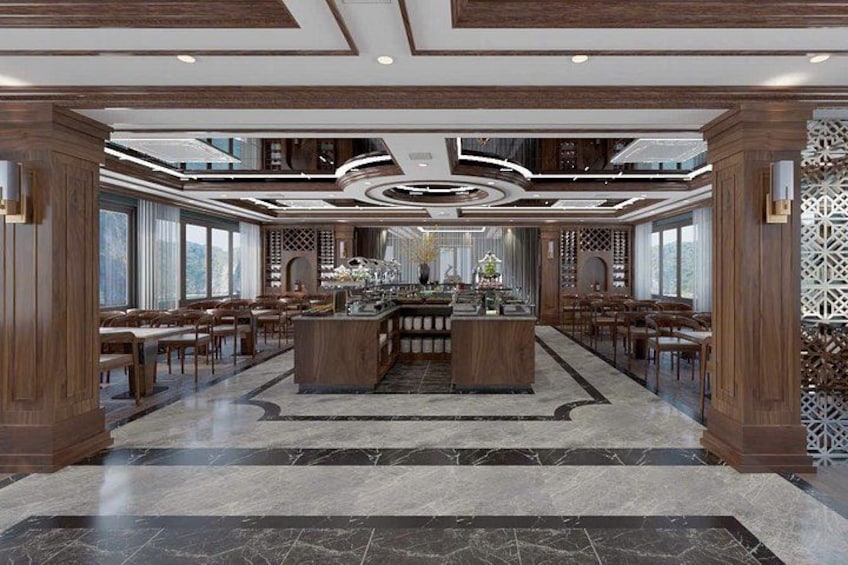 A spacious restaurant with a central bar, wooden furniture, and a decorative ceiling. 3