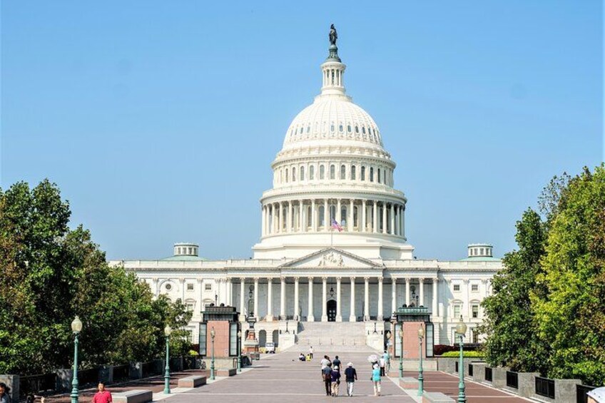 The United States Capitol building with a clear sky. 3