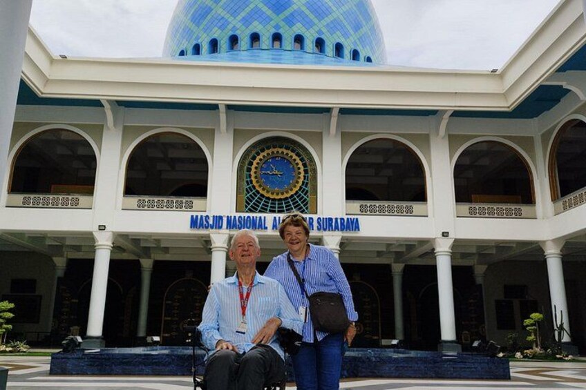A building with a large dome and a sign that reads 'MASJID NATIONAL ALBARDAYA'. 3