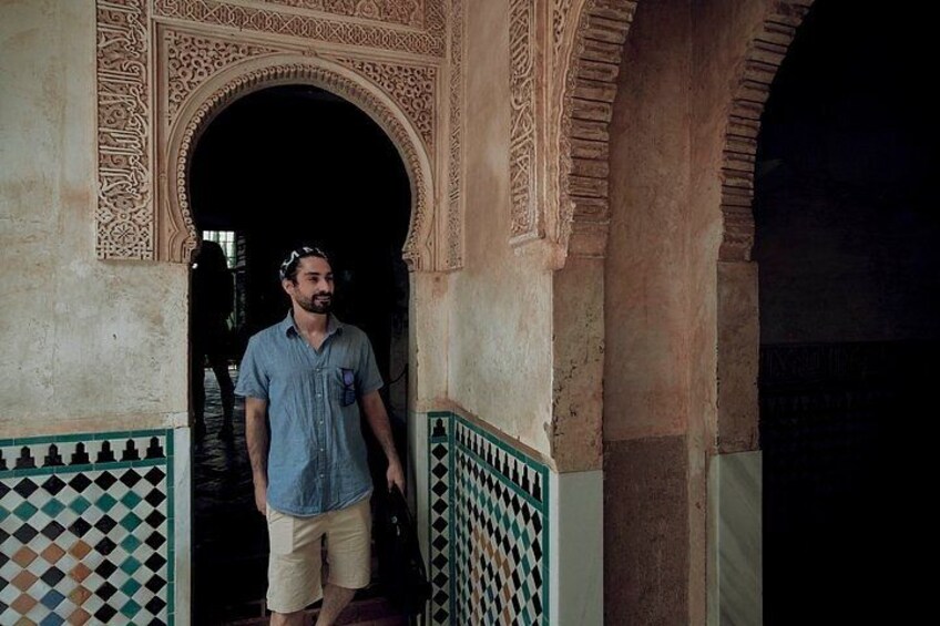 Traveler at doorway with tiles
Step through Alhambra’s iconic doorways where every tile tells a story of heritage, culture, and royal splendor. 3