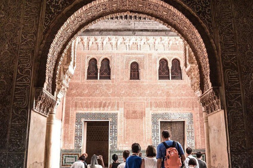 Grand facade with arches
Witness the majestic facades of Alhambra—architectural poetry carved in stone, a legacy of Moorish brilliance. 2