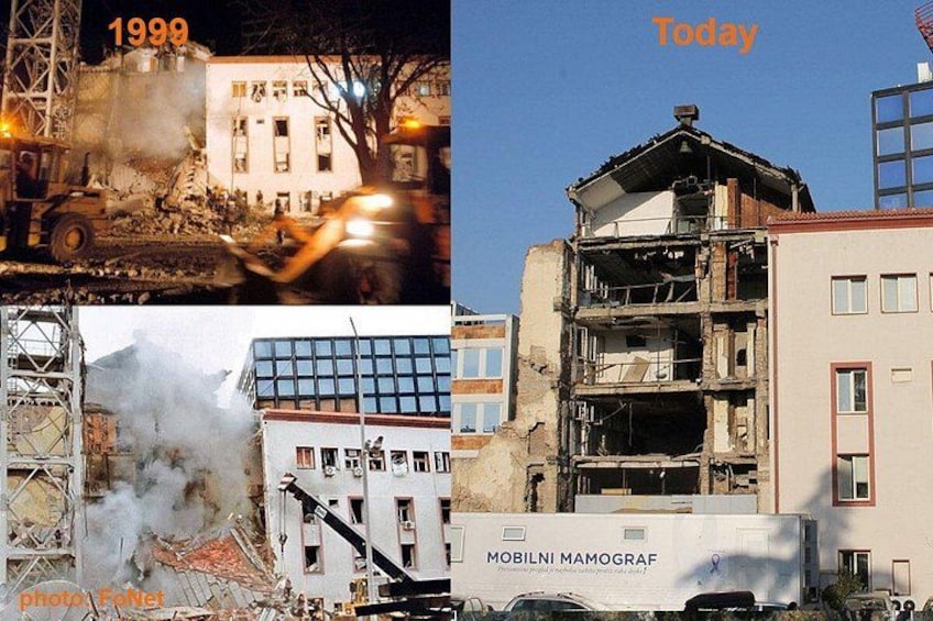 A building with visible damage and construction activity. 3