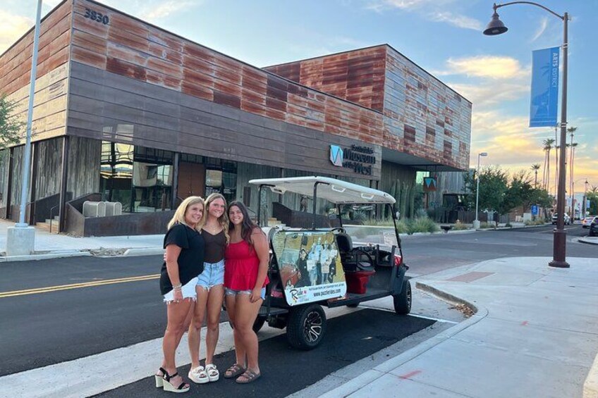 A building with a sign reading "3830" and a golf cart parked in front. 2