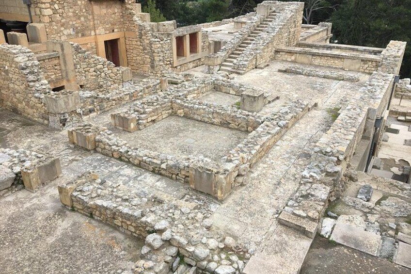 Ancient ruins with stone structures and steps. 2