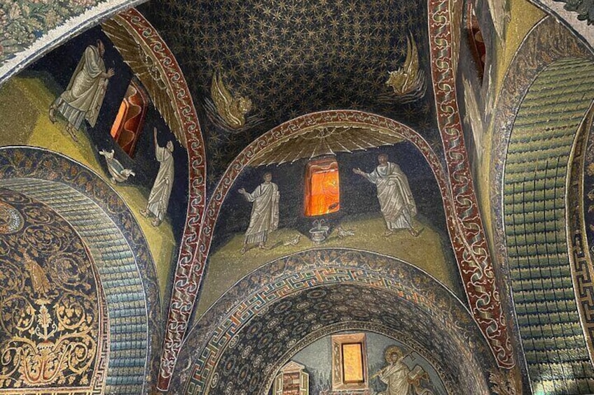 A detailed mosaic with religious figures and geometric patterns. 4