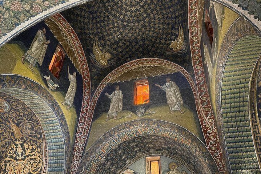A detailed ceiling with intricate mosaics and architectural elements. 2
