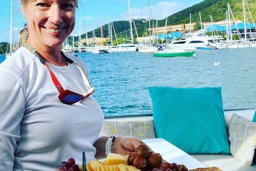 Friendly crew serve a charcuterie board 3