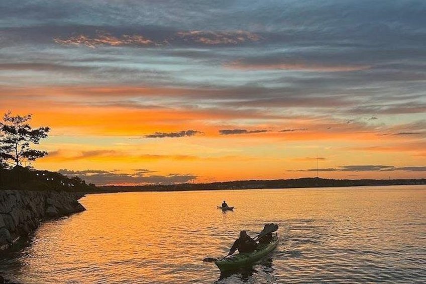 Paddling to shore at the end of a Sunset Kayak Tour 5