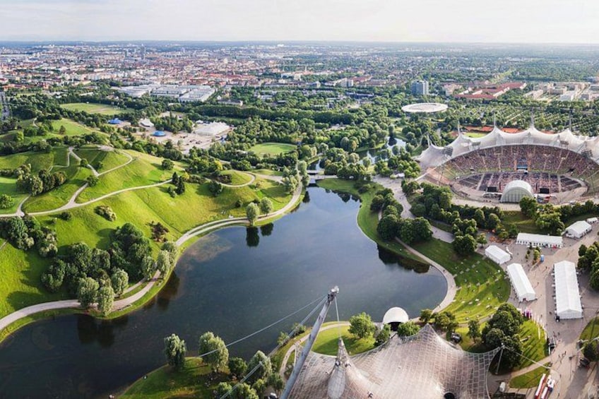 A large stadium, a river, and surrounding green areas. 5