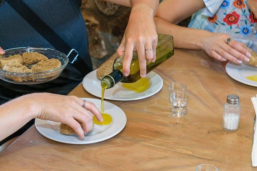 People preparing food, pouring oil, and using salt and pepper shakers. 2