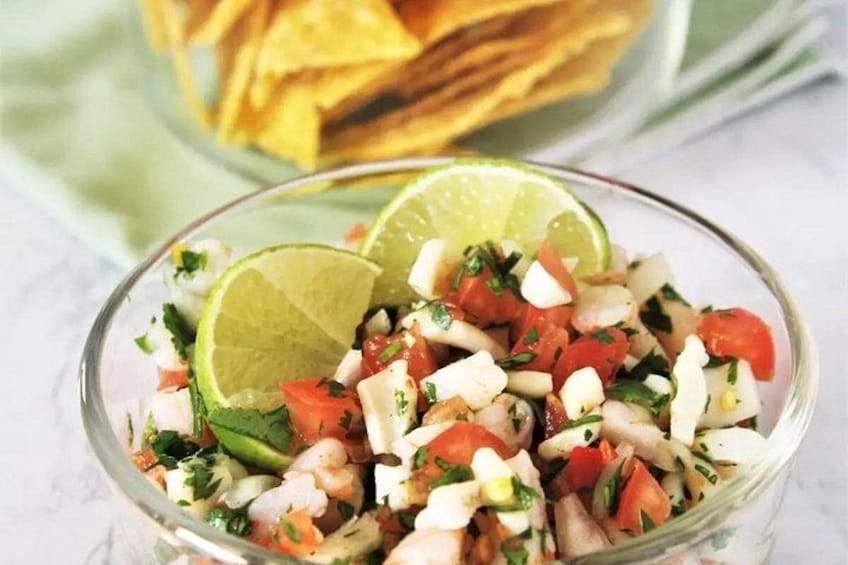 Ceviche, chips, black beans and pico de Gallo as a snack 2