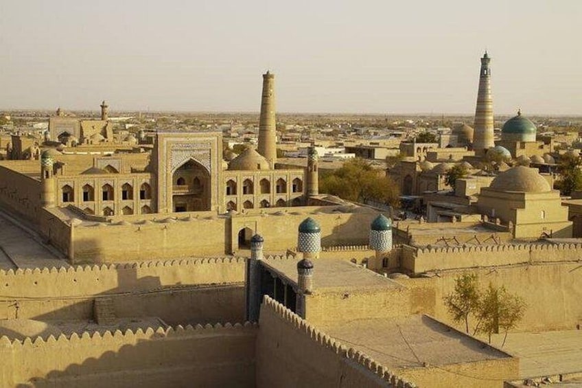A historic cityscape with prominent minarets and domed structures. 4