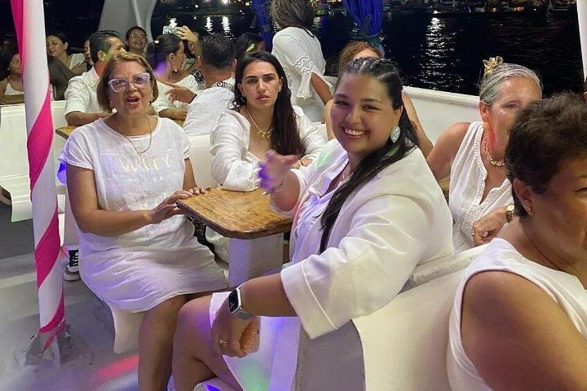 People seated at tables, some holding trays. 4