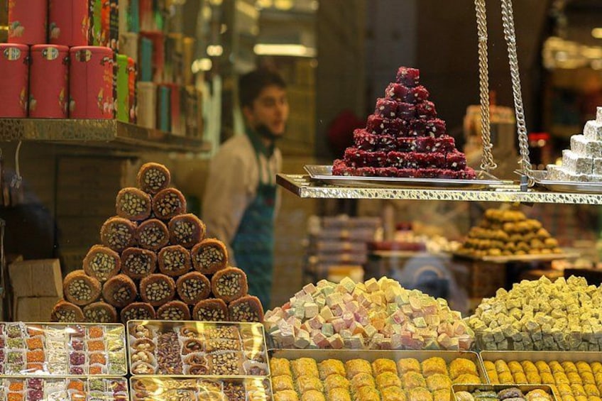 A variety of colorful sweets displayed in a market. 5