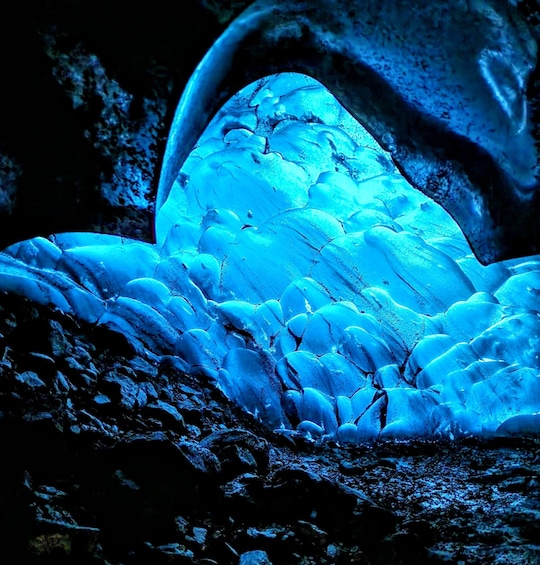 A glacier with blue ice formations. 2