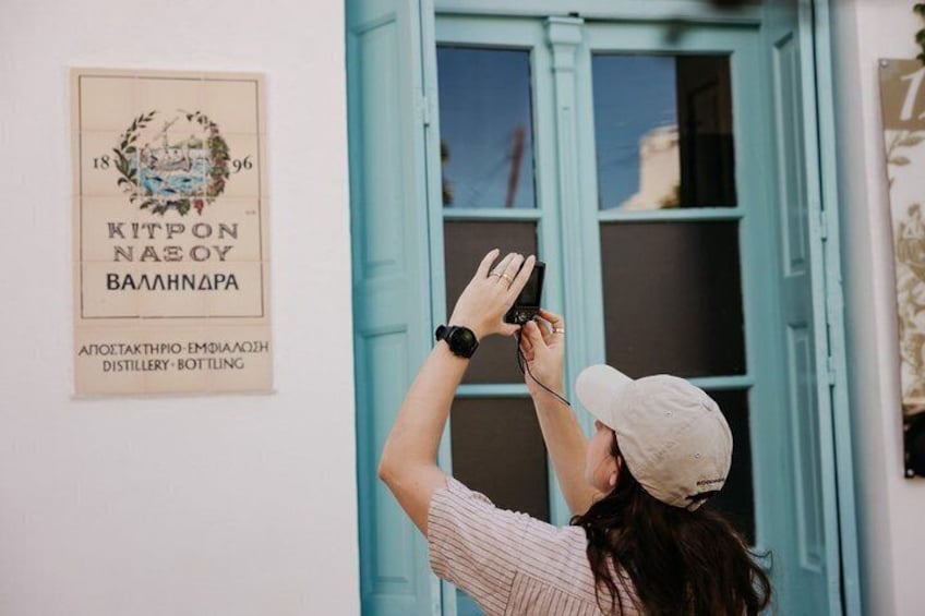 A person taking a photo with a smartphone. 5