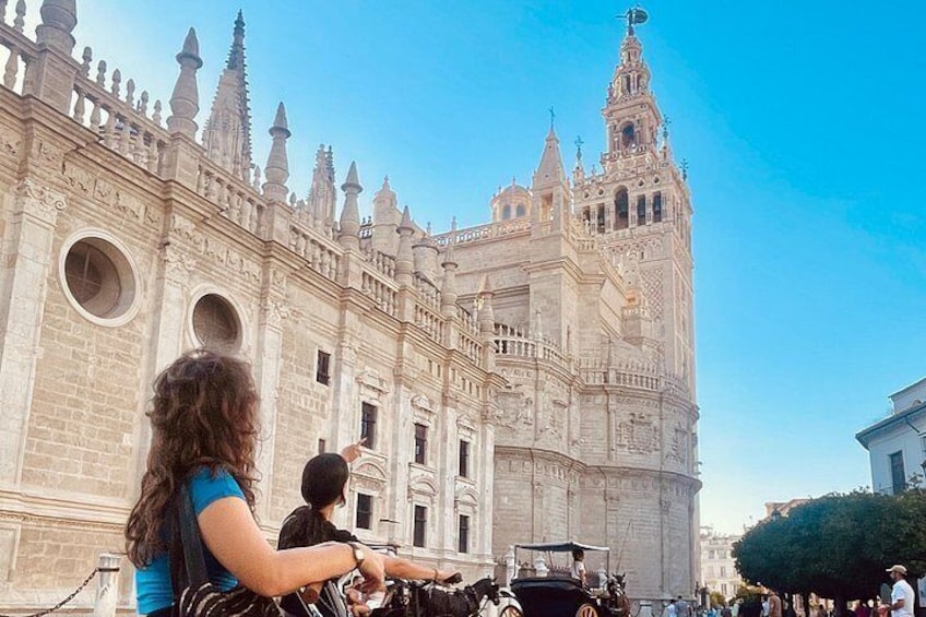 A historic building with intricate architecture and a prominent tower. 3