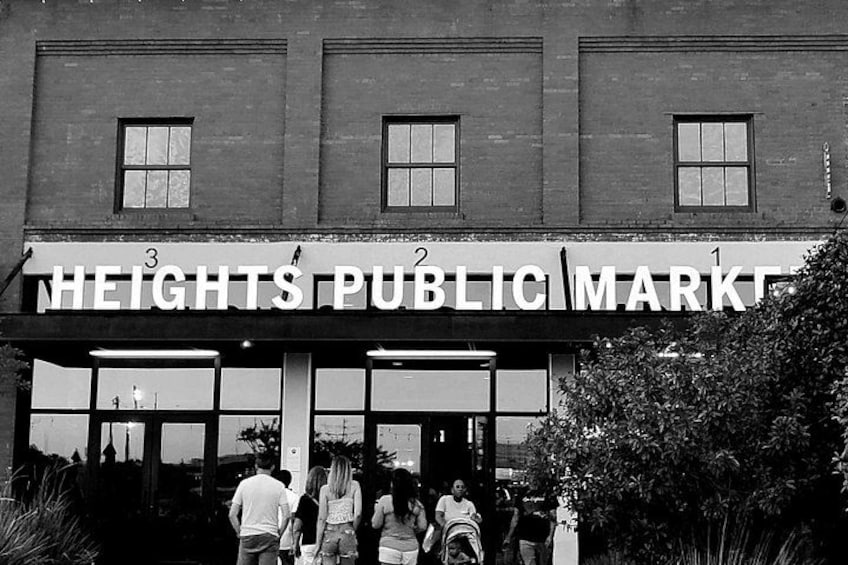 A building with a sign reading 'Heights Public Market.' 5