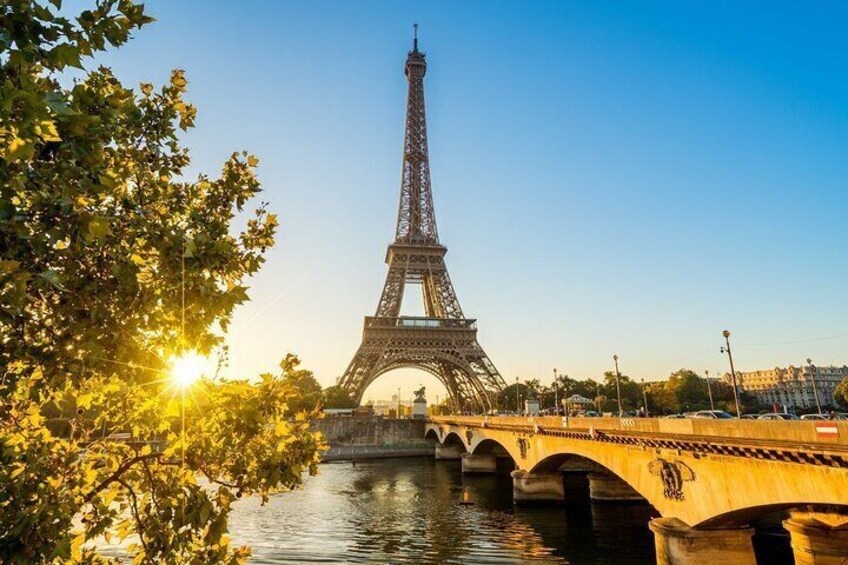 The Eiffel Tower, a bridge, and a river. 4