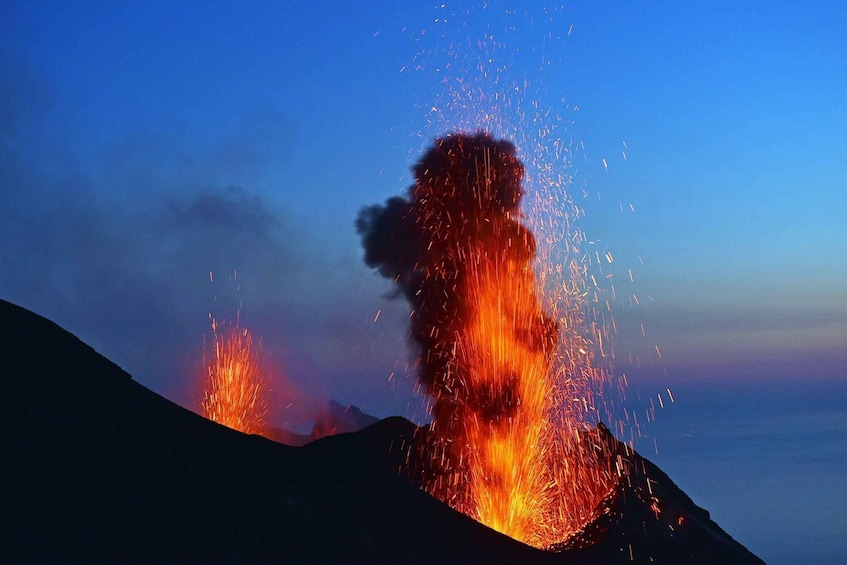 A volcanic eruption with lava and smoke. 1