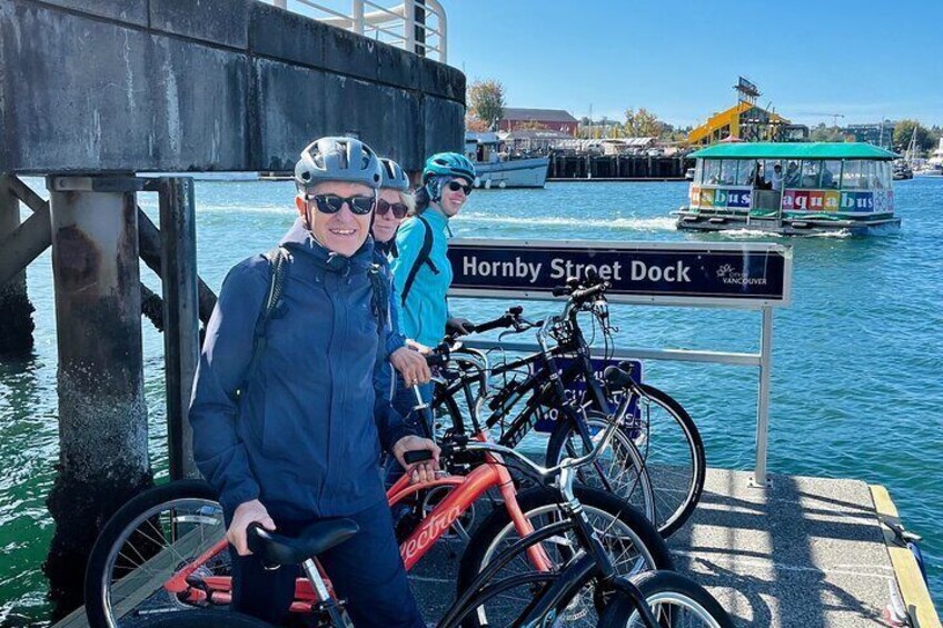A dock with bicycles and a sign reading 'Hornby Street Dock.' 5