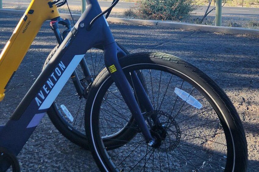 A bicycle with the brand name 'AVENTON' on the frame. 3