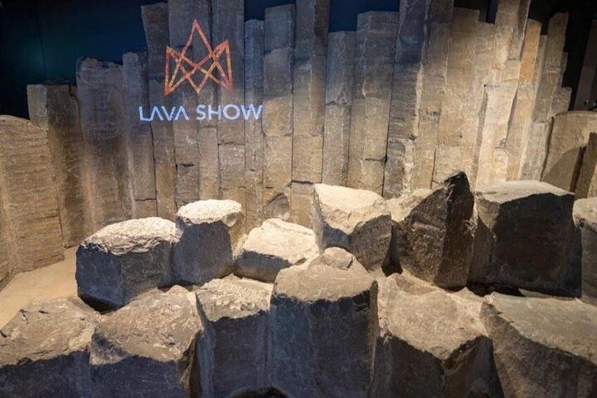 A lava flow with large rocks and the text "LAVA SHOW". 2