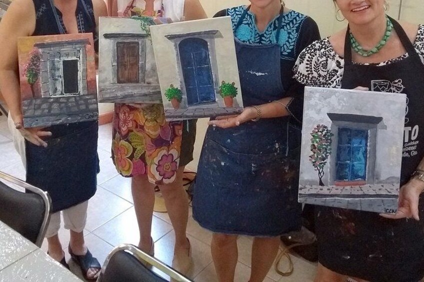 People holding framed paintings of buildings. 5