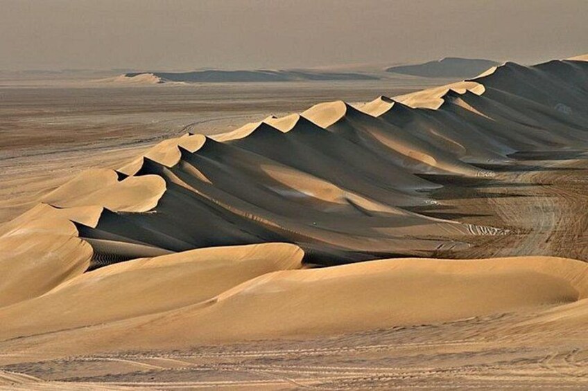 Sand dunes in a desert landscape. 4