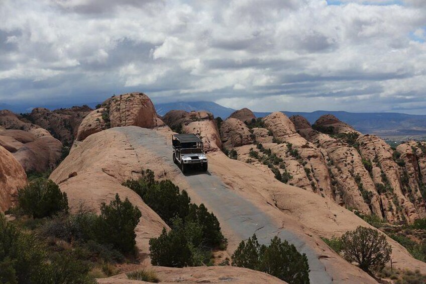 Explore the breathtaking views of Hell's Revenge trail. 5