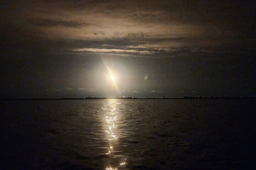 A rocket launching while kayaking on the water.