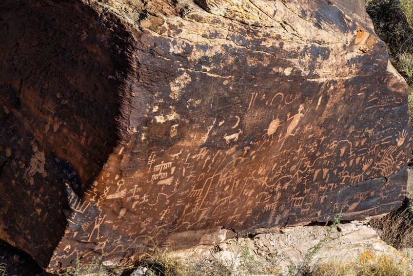 A large rock with ancient petroglyphs. 5
