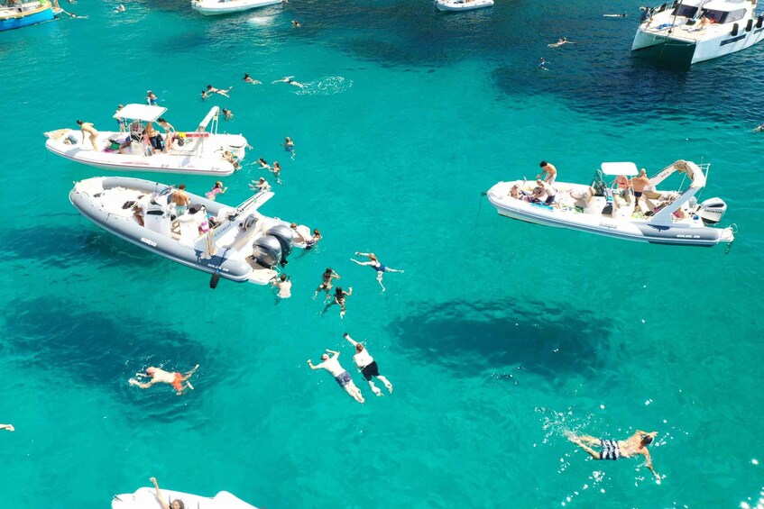 Picture 20 for Activity Cagliari: Boat Tour, 4 Stops, Swim, Snorkeling, & Spritz 2