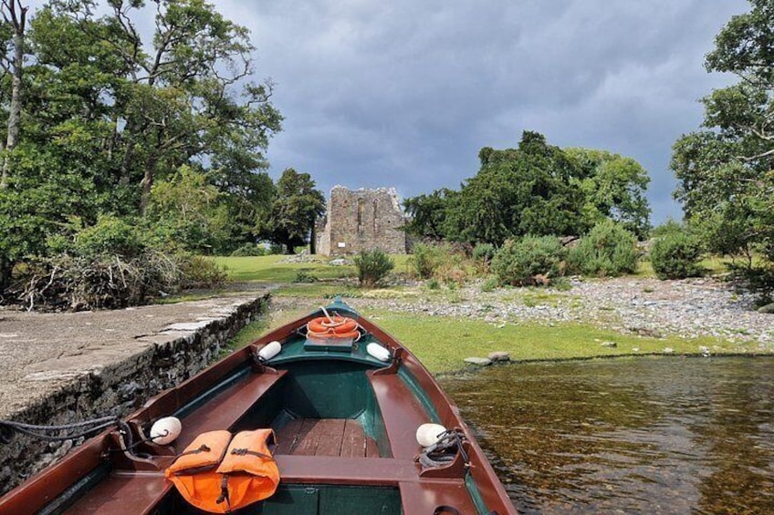 The Otter, our boat, resting at the pier at Innisfallen as guests visit the island. 2