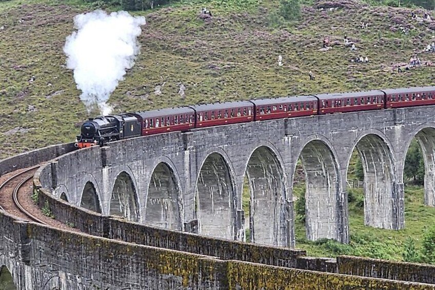 The Jacobite Train crossing Harry Potter Bridge Glenfinnan 2