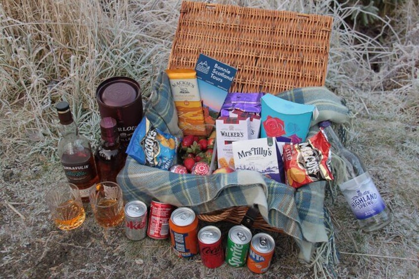 Enjoy a luxury Scottish hamper packed with traditional snacks, drinks, and local treats to make your journey through Scotland extra special. 2