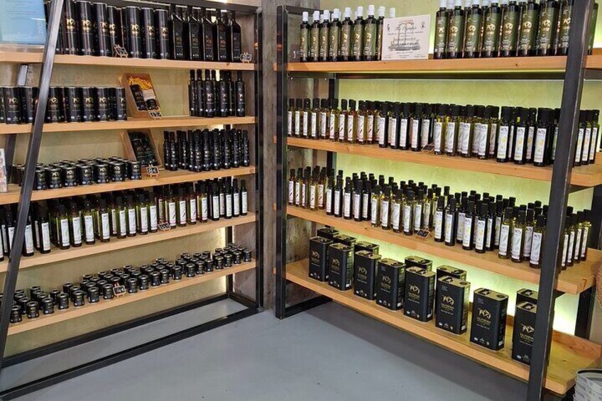 Shelves stocked with various bottles of wine and spirits. 4
