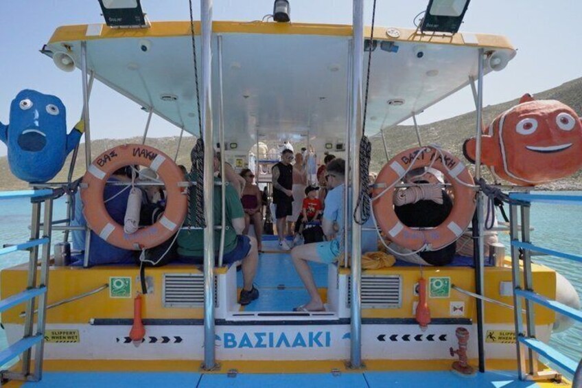 A boat with life rings and a mascot figure. 4