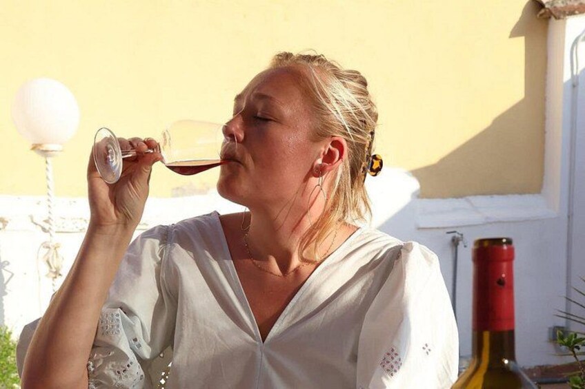 Marloes enjoys a Mallorcan red wine on our rooftop terrace. 5