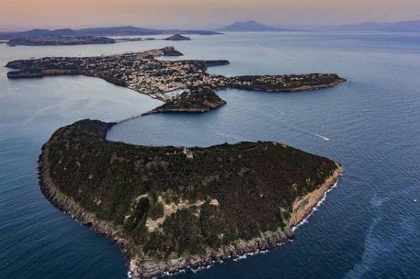 An aerial view of a coastal area with multiple islands connected by narrow waterways. 5