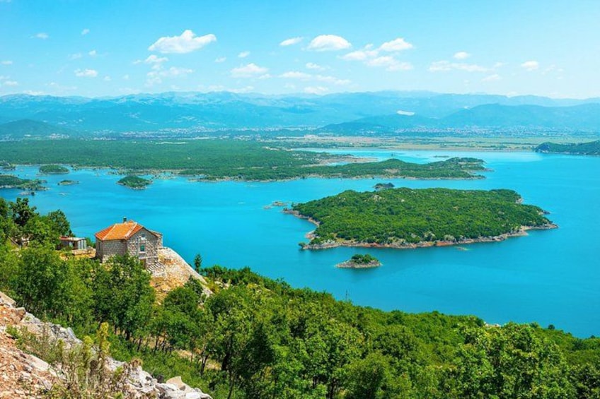 Aerial view of a house above the Skadar lake and its islands 5