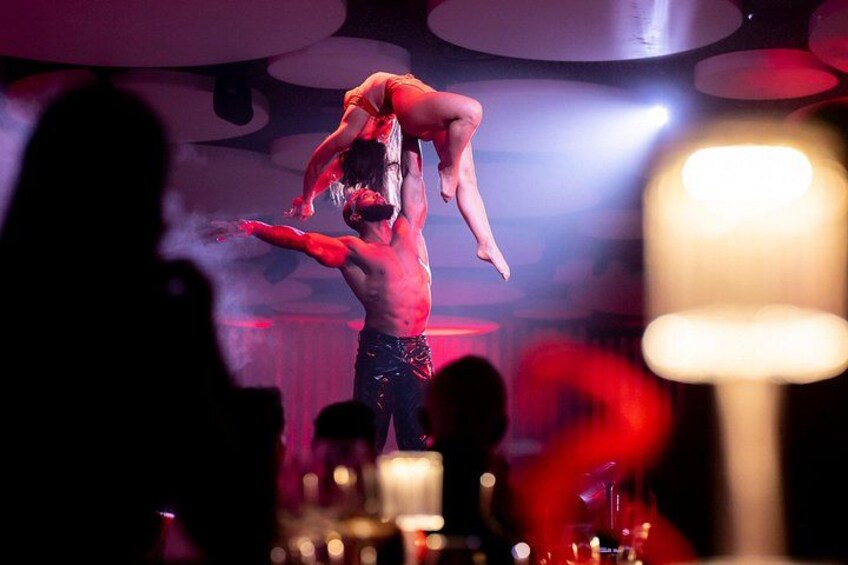 A circus performance with acrobats. 1