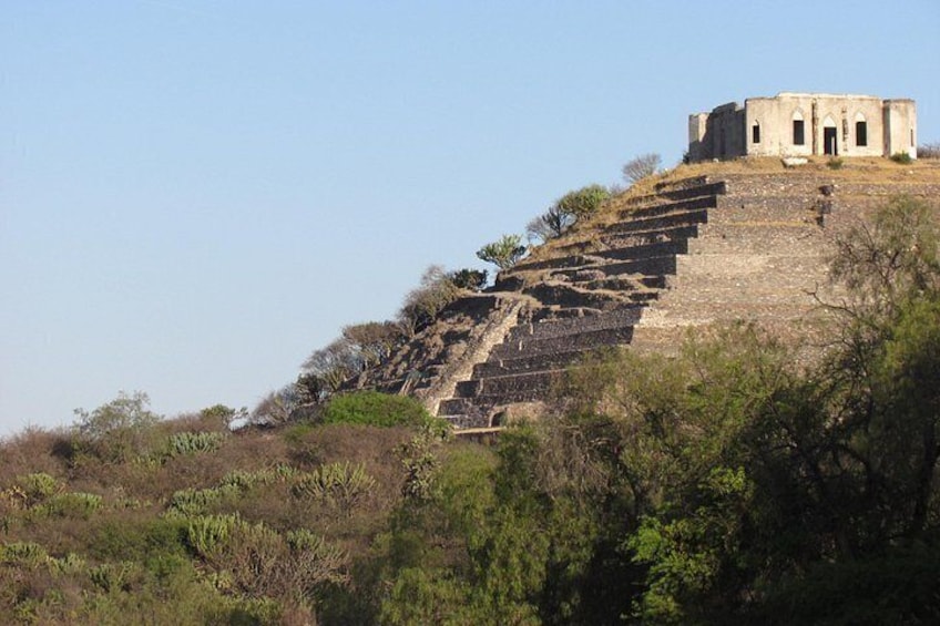 Pyramid's south side and small fortress on top. 4