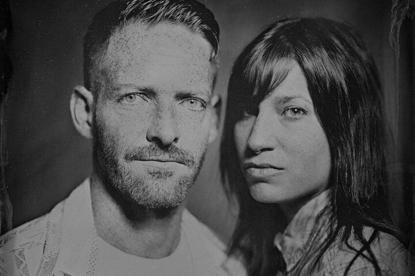 A man and a woman in a black and white portrait. 5