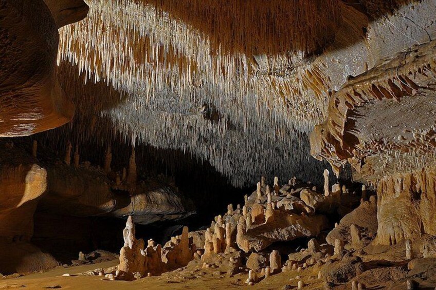 A cave with stalactites and stalagmites. 2