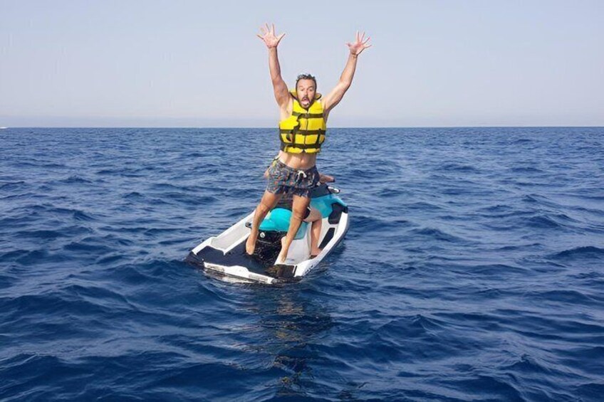 A day at sea in Cala Blanca with paella and jet ski 5