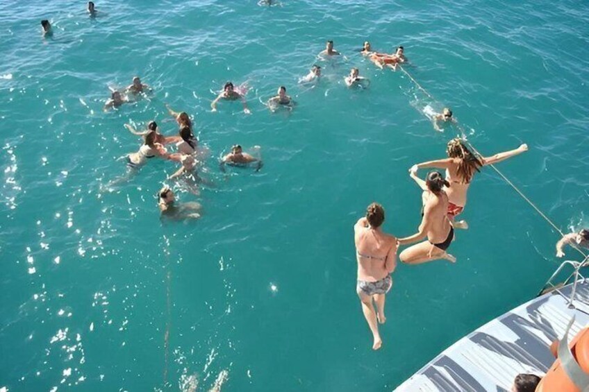 A day at sea in Cala Blanca with paella and jet ski 3