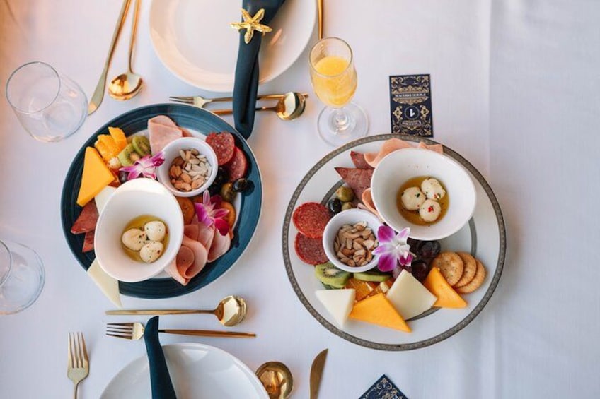 Savor the finest selections of meats and artisanal cheeses with our elegant charcuterie boards, perfectly paired with premium beverages. 5